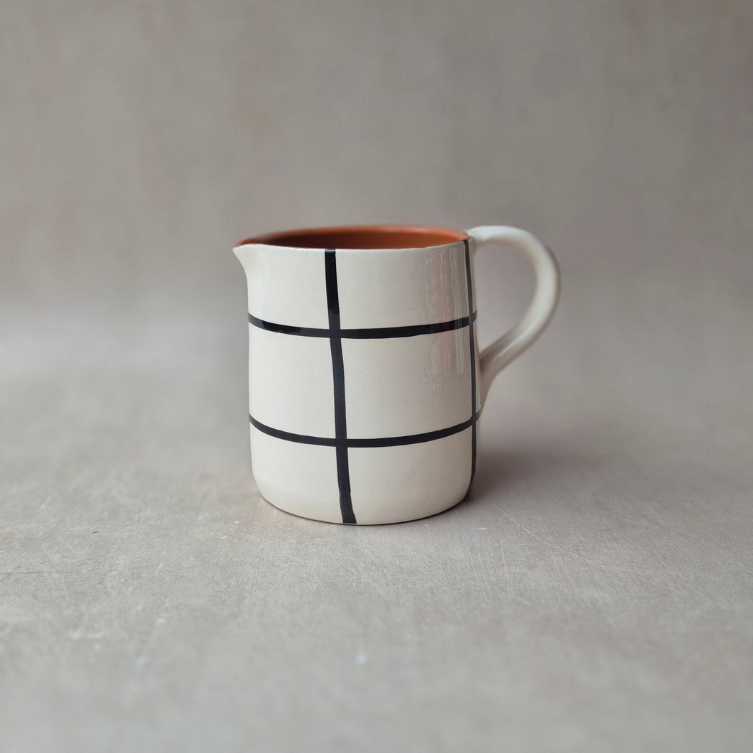 Gerader Krug klein kariert schwarz