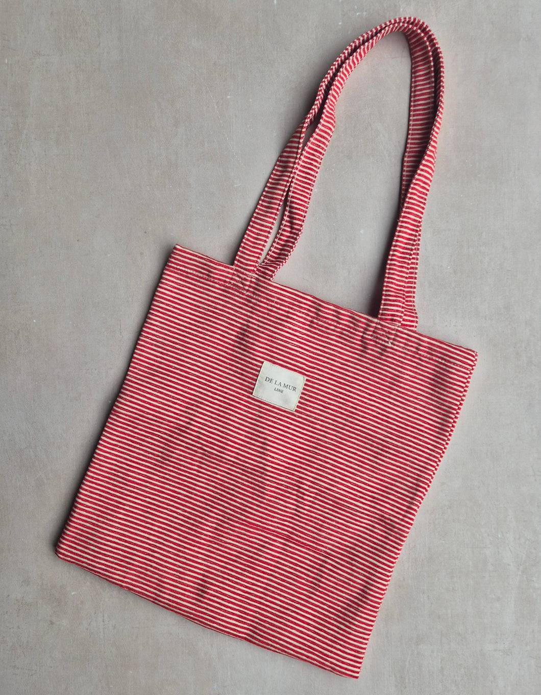Kleine Tasche aus softem Cord poppy