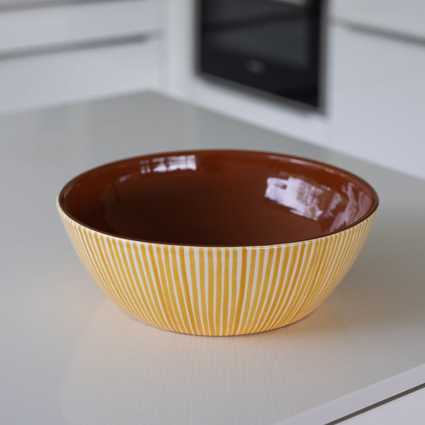 Striped ocher salad bowl
